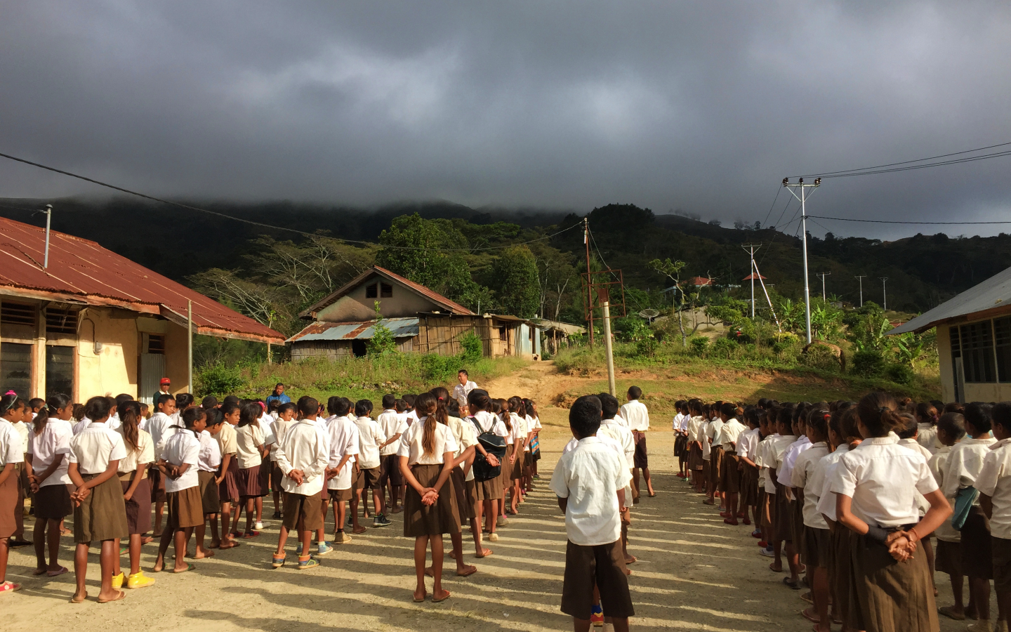 Children lining up at school in Timor-Leste