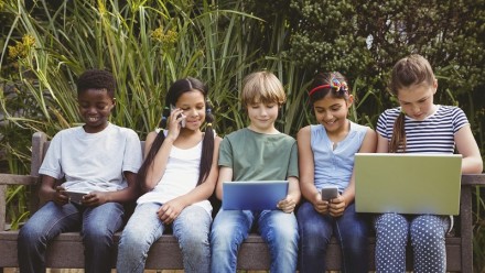 Children accessing the internet on devices